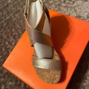 New ! Never worn in box! Champagne colored sandals.